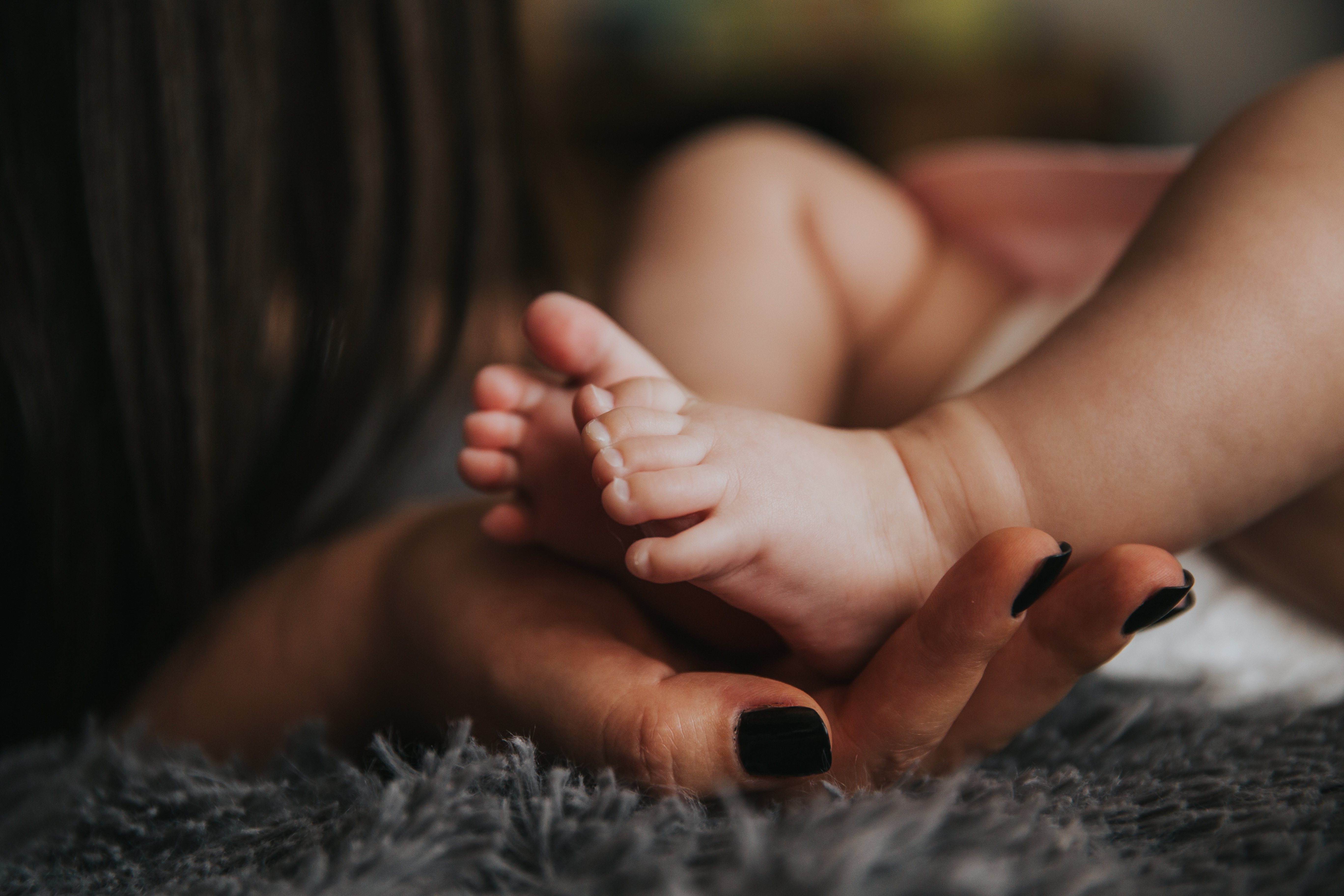 A closeup of an infant's feet